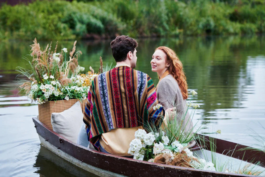 Couple rowing on the lake