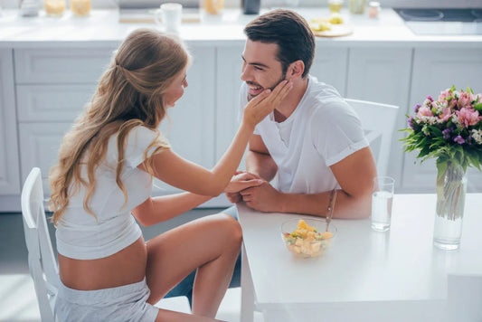 Couple looking at each other in the living room